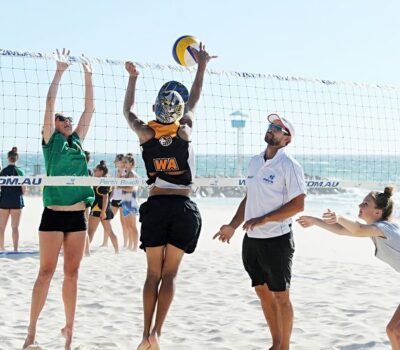 Perth Beach Volleyball School director Marty Suan coaching elite students, from left, Tyana Johnson (15, Attadale), Riley Fissioli (12, Landsdale) and Janais Moloney (13, Wembley Downs) [NAMES OK]
